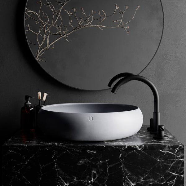 Unrefined Nido Concrete Basin – handcrafted round concrete sink with soft minimalist curves, designed for modern bathroom spaces