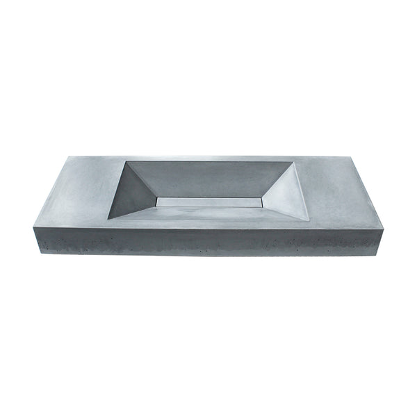 Studio view of Vara XL sink in soft grey concrete finish, showing long rectangular form